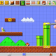 A screenshot from Mario Maker, with a human hand holding a stylus over the platforming screen.